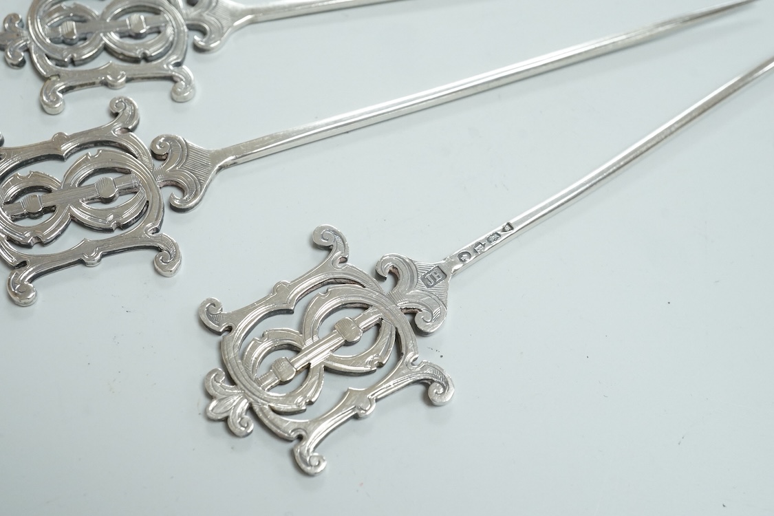A set of eight Victorian silver game skewers?, with monogram terminals, Jane Brownett, London, 1877, 12,8cm.